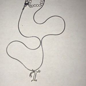 Avon Initial Necklace “T” Silver Tone and Clear Stones with Snake Chain.